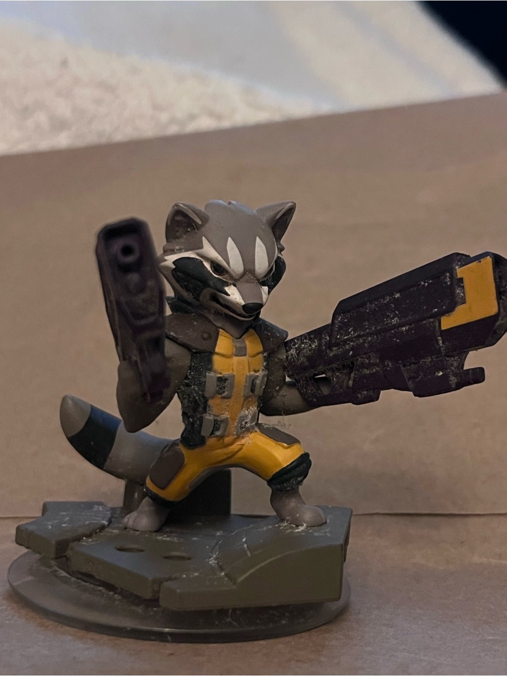Disney Rocket Raccoon Figure in Yellow and Gray